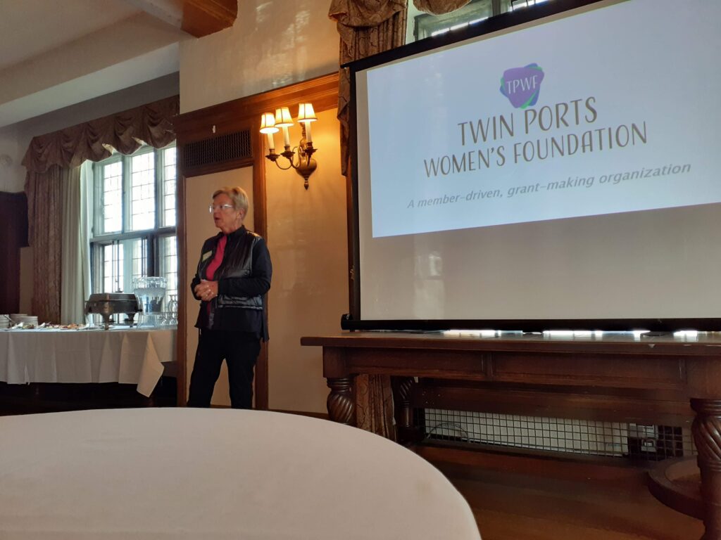Denise Bussa, TPWF Board Chair, speaks to the attendees of the 2022 Annual Celebration on May 23rd at the Kitchi Gammi Club